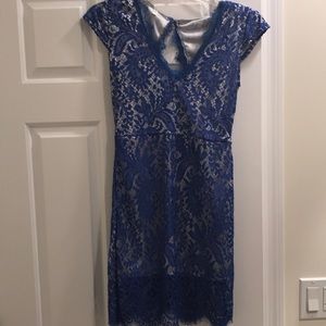 Blue laced dress with open back.. never worn!